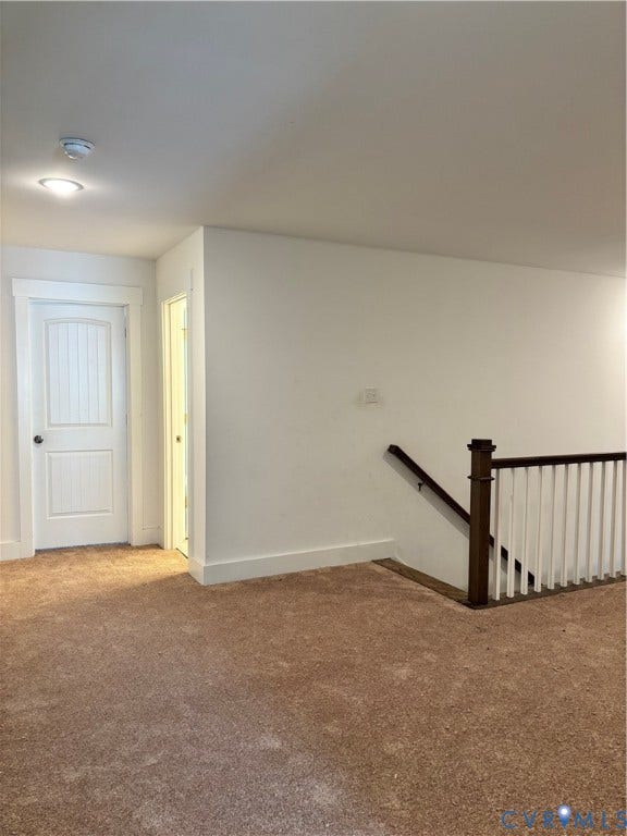 10963 Little Five Loop, Henrico, VA 23059 Carpeted floor, white walls, white paneled door, recessed lighting, and a dark wood and white baluster staircase