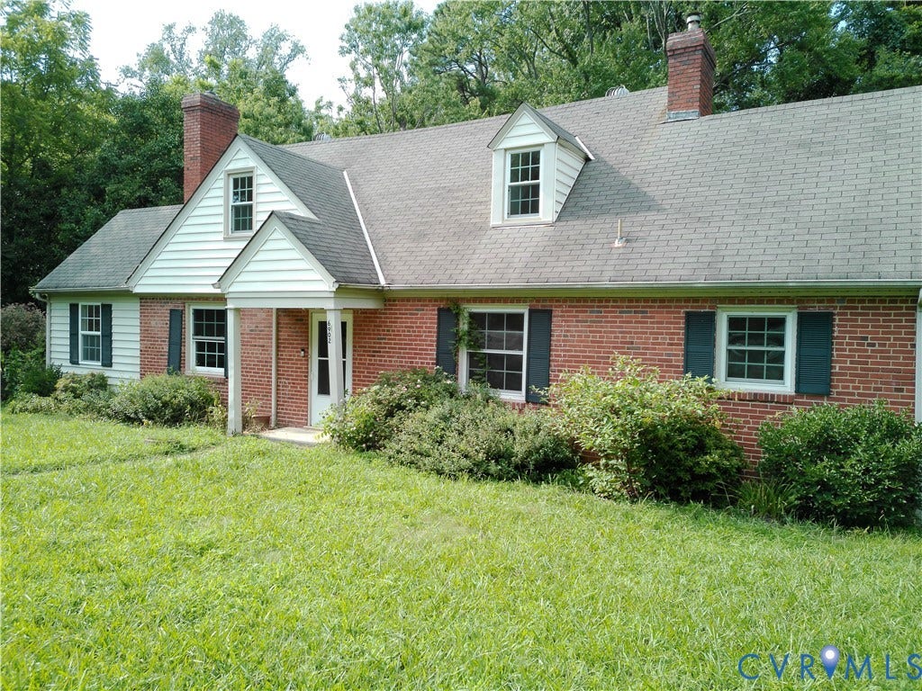 6902 Old Jahnke Road, Richmond, VA 23225 Brick exterior with white siding accents and a covered front entry