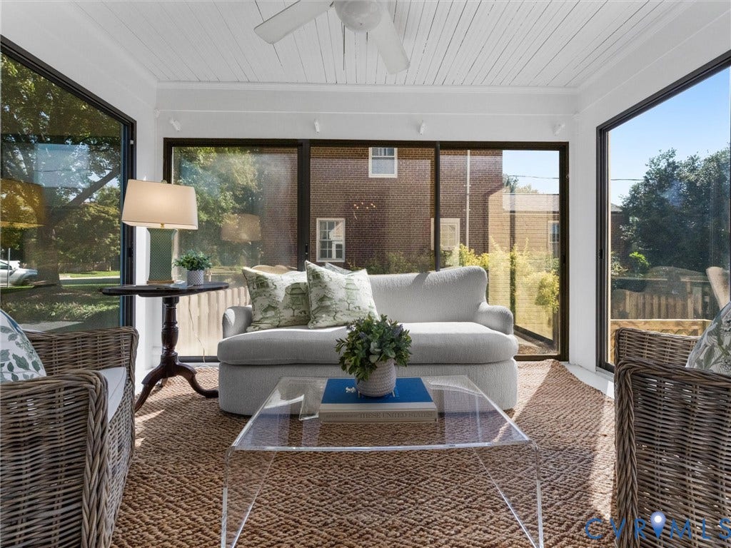 Sunroom with full-height windows, a tongue-and-groove ceiling, and a ceiling fan
