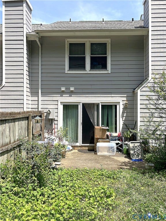 12323 Frisco Drive, Henrico, VA 23233 Rear exterior featuring horizontal siding, a double-pane window, and a sliding glass door