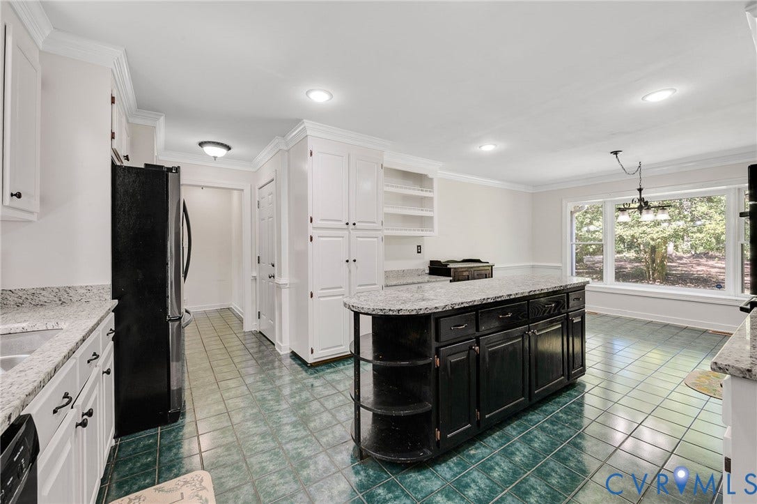 2409 Three Bridge Road, Rural, Powhatan, VA 23139 Kitchen with granite countertops, white cabinetry, a dark-toned island, recessed lighting, and a large window