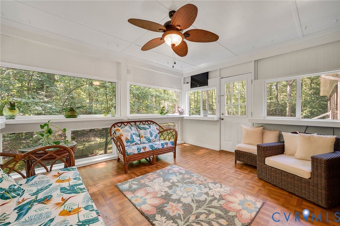 2409 Three Bridge Road, Rural, Powhatan, VA 23139 Expansive sunroom featuring rich wood-finish flooring, a white paneled ceiling, and a ceiling fan