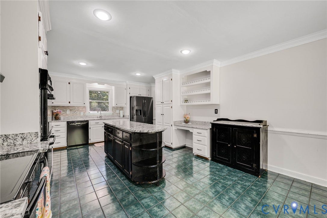 2409 Three Bridge Road, Rural, Powhatan, VA 23139 Kitchen with white cabinetry, black appliances, granite countertops, and a black kitchen island