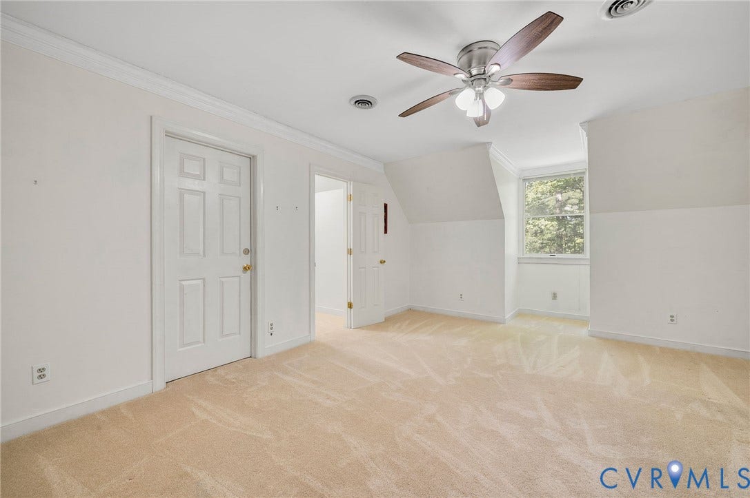 2409 Three Bridge Road, Rural, Powhatan, VA 23139 Carpeted room with a ceiling fan, crown molding, and multiple paneled doors