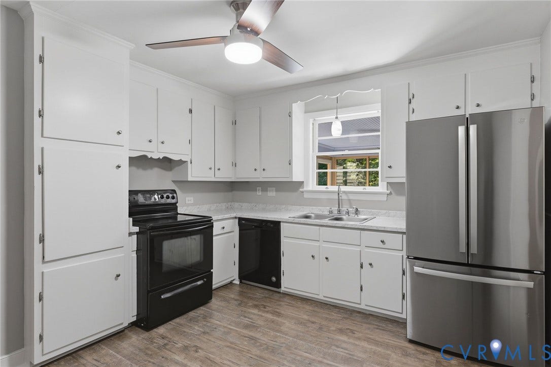 8349 Charlise Road, Oxford, Richmond, VA 23235 Kitchen featuring white cabinetry, wood-finish flooring, a stainless steel refrigerator, black electric range, and a ceiling fan with integrated lighting