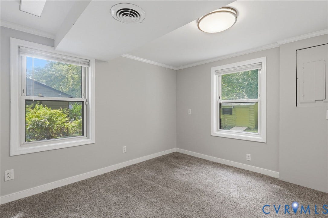 8349 Charlise Road, Oxford, Richmond, VA 23235 Plush carpet flooring, recessed ceiling lighting, two windows, and crown molding