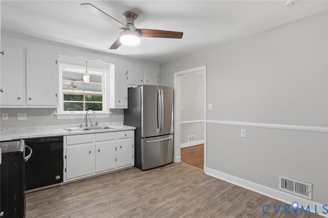 8349 Charlise Road, Oxford, Richmond, VA 23235 Kitchen featuring white cabinetry, wood-finish flooring, stainless steel refrigerator, and a ceiling fan with integrated lighting