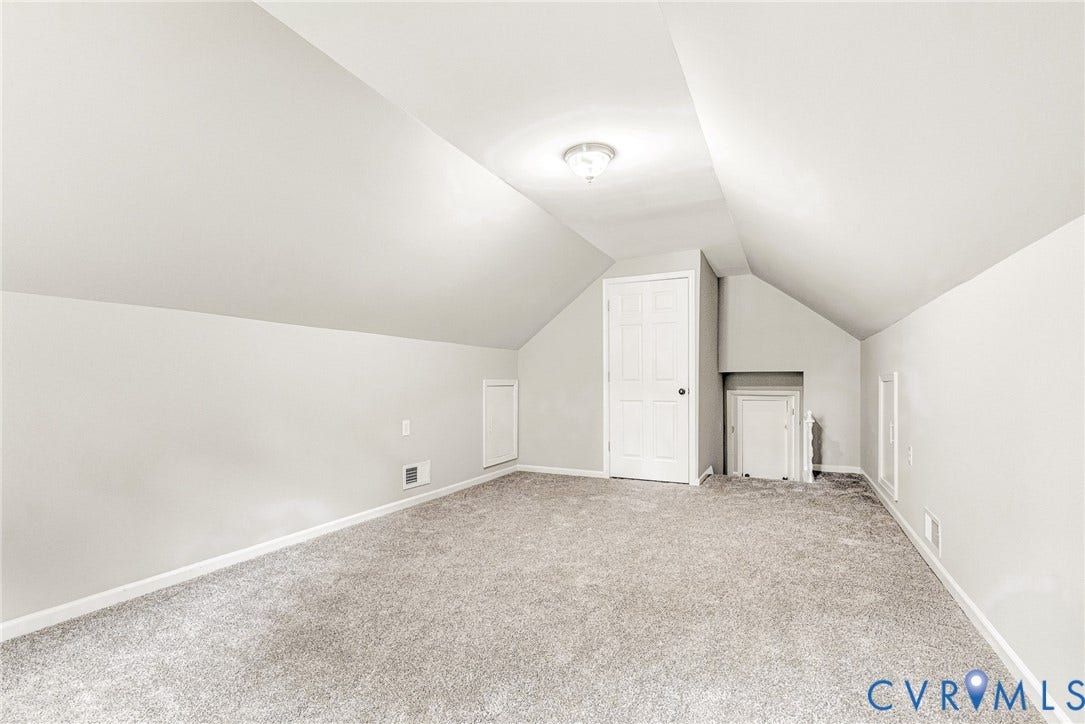 1605 CLOISTER Drive, Henrico, VA 23228 Carpeted room with sloped ceilings, a flush-mount light fixture, and two panel doors