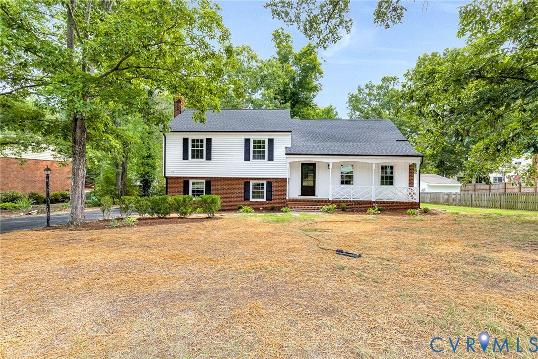 1605 CLOISTER Drive, Henrico, VA 23228 Two-story residence featuring white siding and brick detailing