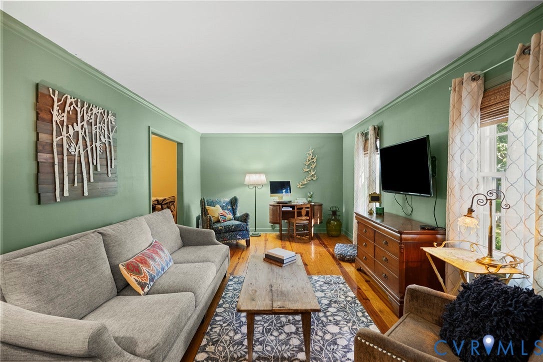 Hardwood flooring, crown molding, double windows with blinds, and recessed lighting