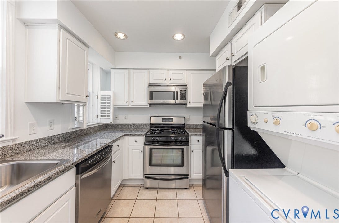 24 W Locke Lane, #1, Richmond, VA 23226 White cabinetry with stainless steel hardware, built-in stainless steel appliances, granite countertops, tile flooring, and recessed lighting