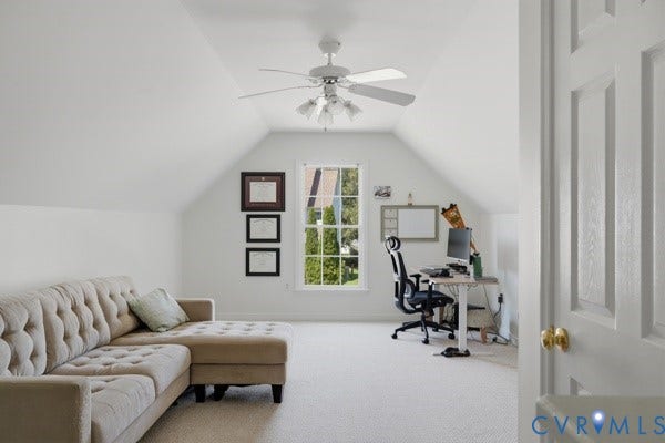 Attic space with sloped ceilings, a single window, and a ceiling fan with integrated lighting