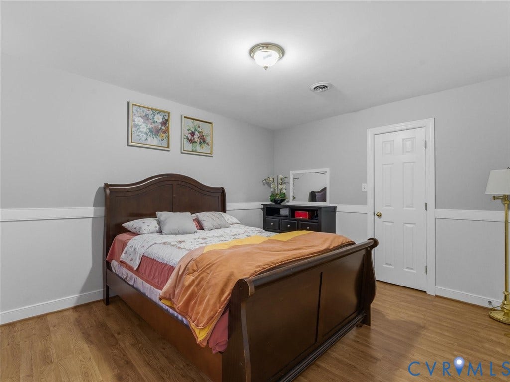 3489 Richards Run, Powhatan, VA 23139 Wood-finish flooring, white paneled door, and recessed ceiling light fixture