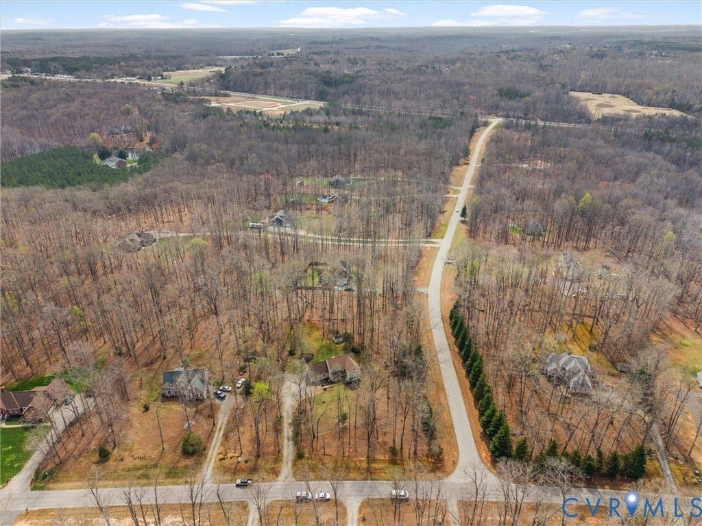 3489 Richards Run, Powhatan, VA 23139 Extensive wooded surroundings, established paved roads, and scattered residential properties