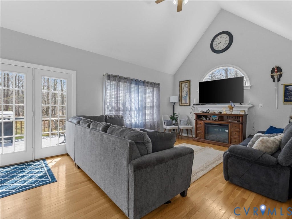 3489 Richards Run, Powhatan, VA 23139 Vaulted ceiling with ceiling fan, wood-finish flooring, and French doors