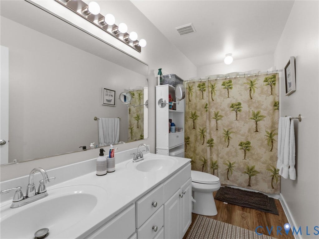 3489 Richards Run, Powhatan, VA 23139 Dual sink vanity with white countertop and chrome fixtures