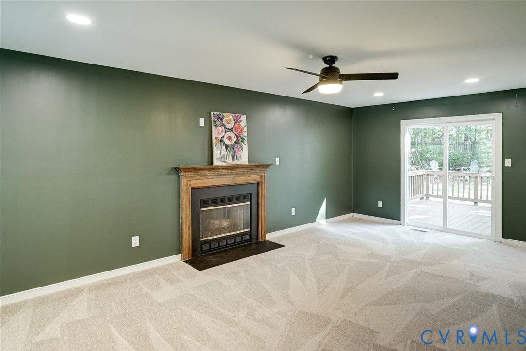 2388 Horsley Drive, Henrico, VA 23233 Spacious living room has new carpet and new sliding glass doors leading to backdeck