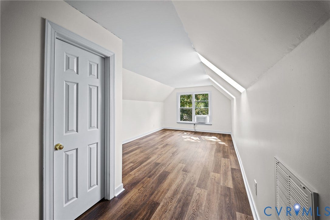 1608 Queens Point Drive, Henrico, VA 23238 Interior space featuring wood-finish flooring, vaulted ceilings, and a single-panel recessed door