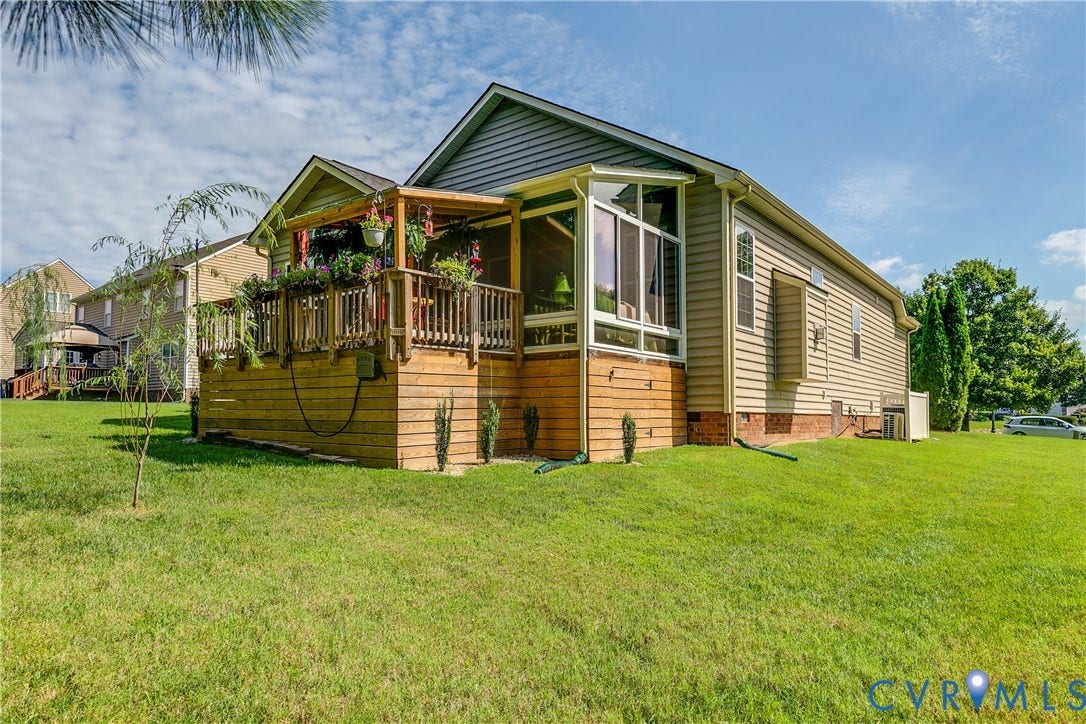 Exterior View of Florida Room and Outdoor Deck.