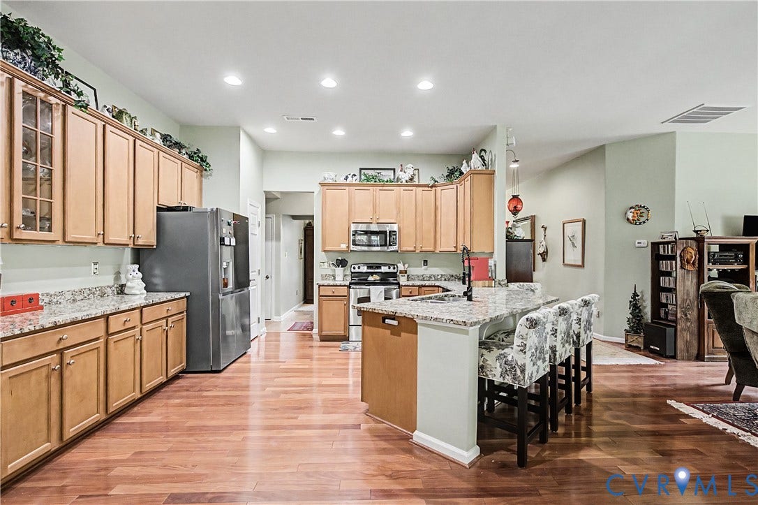 Kitchen Featuring an Abundance of Cabinets for Extra Storage.