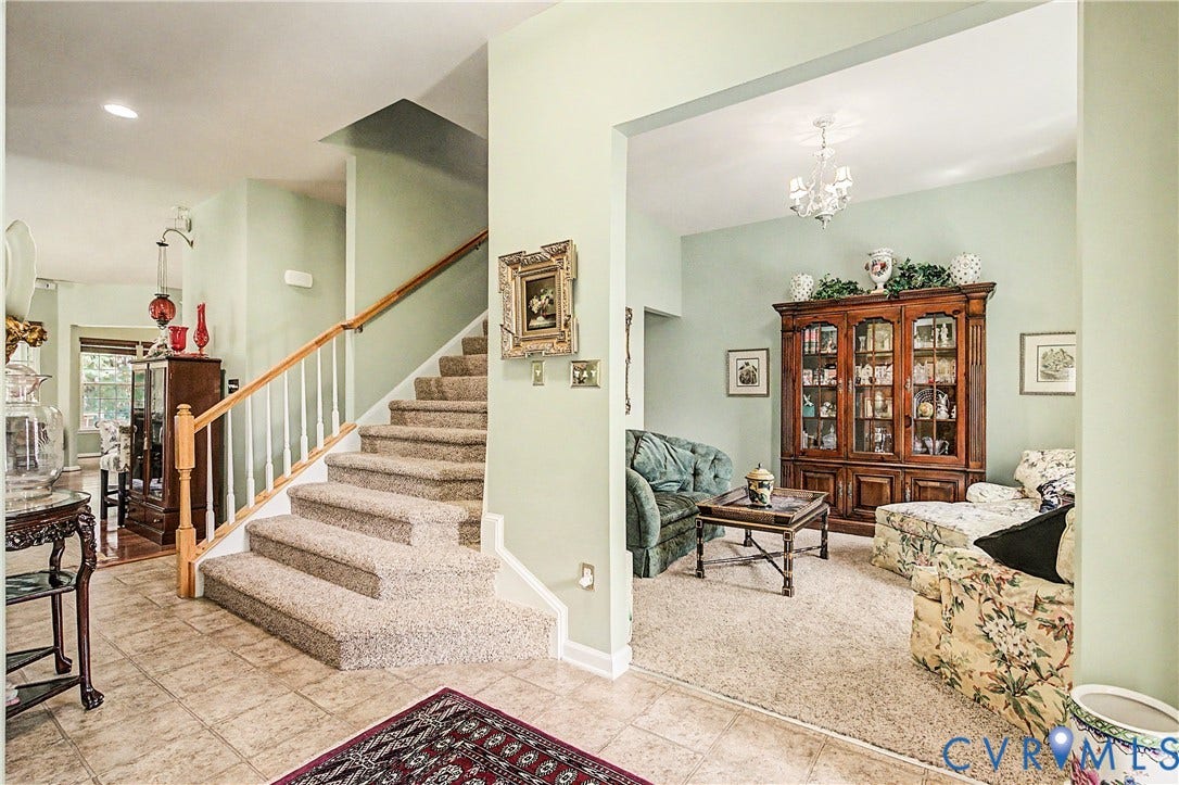 Foyer Featuring Tile Flooring - Staircase Leads to 4th Bedroom - Rec Room.