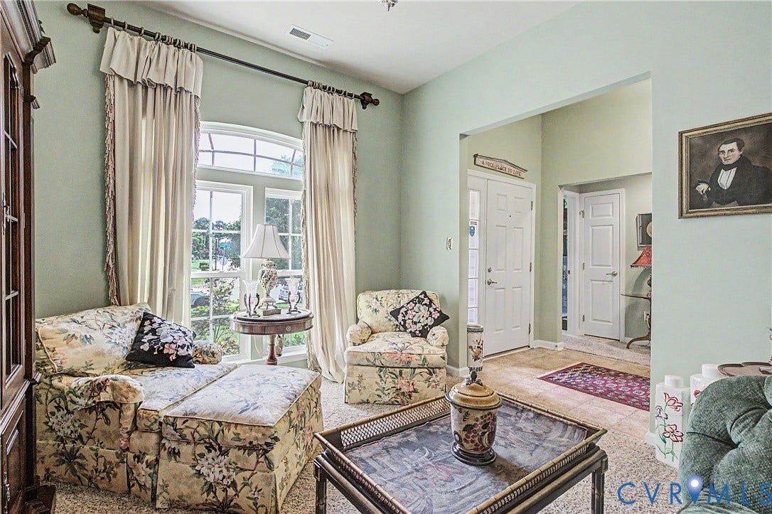 Living Room Featuring Arched Transom Window.
