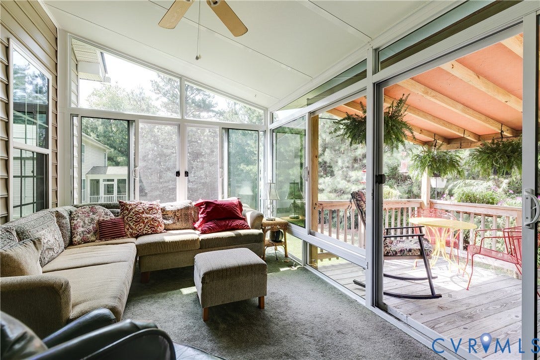 Florida Room Fully Opens to Covered Back Porch.