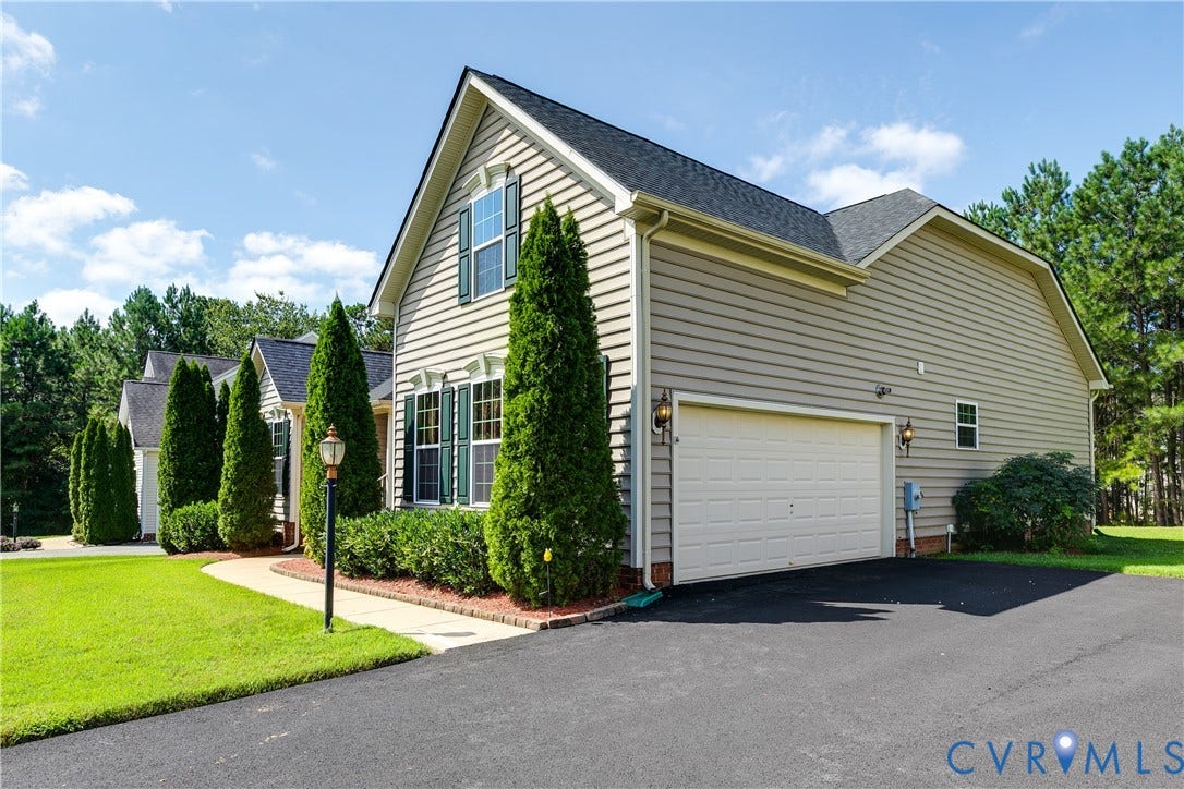 Side Entry 2-Car Garage Featuring Heat and Air-Conditioning.