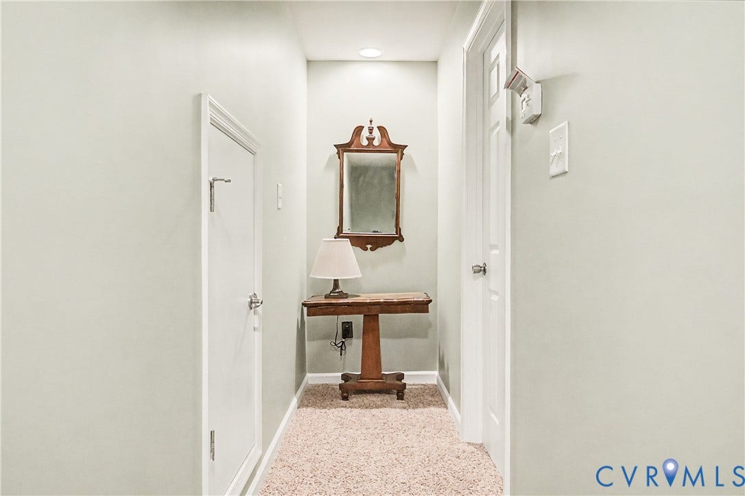 Carpeted Hallway Leading to 4th Bedroom - Rec Room.
