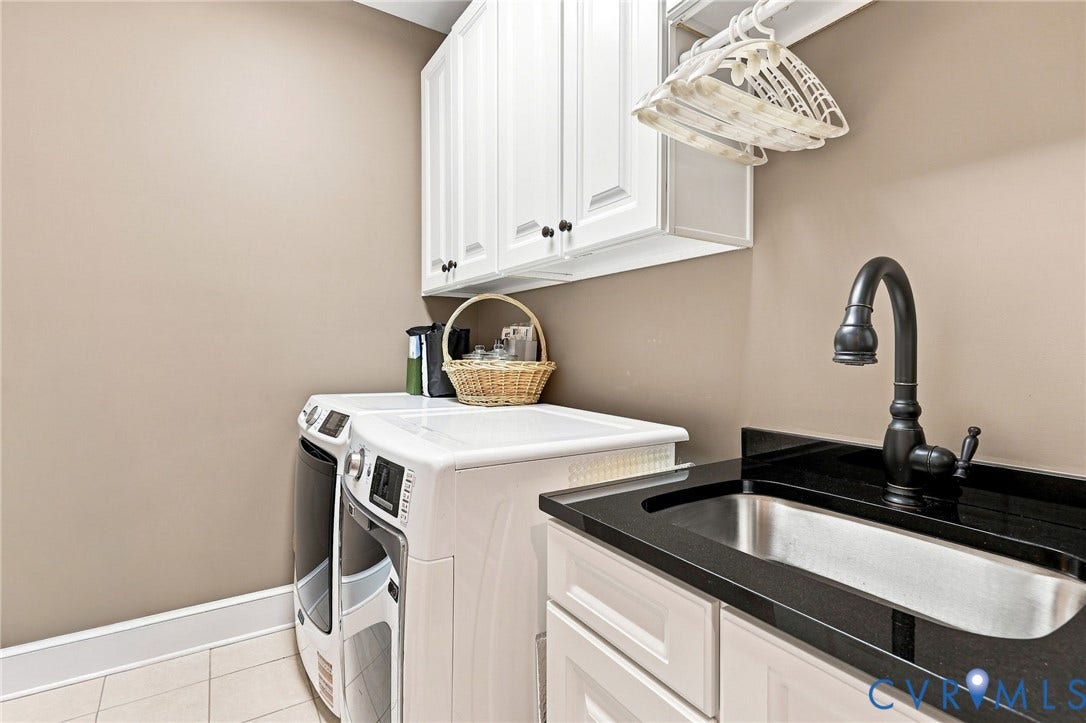 11762 Triple Notch Terrace, Three Notch Place, Henrico, VA 23233 Laundry area featuring white cabinetry, a dark countertop, an undermount sink, and a dark-finish faucet