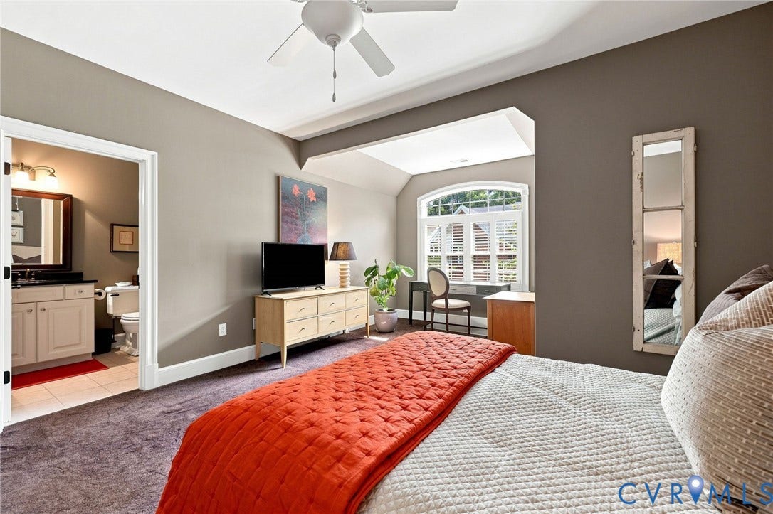 11762 Triple Notch Terrace, Three Notch Place, Henrico, VA 23233 2nd primary suite on level 2, with arched window in sitting area (with shutters and solar film), and an attached bathroom featuring a raised height vanity with granite top and tub/shower combo