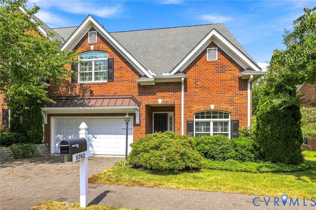 11762 Triple Notch Terrace, Three Notch Place, Henrico, VA 23233 Brick exterior with white trim, a gabled roof, and black shutters