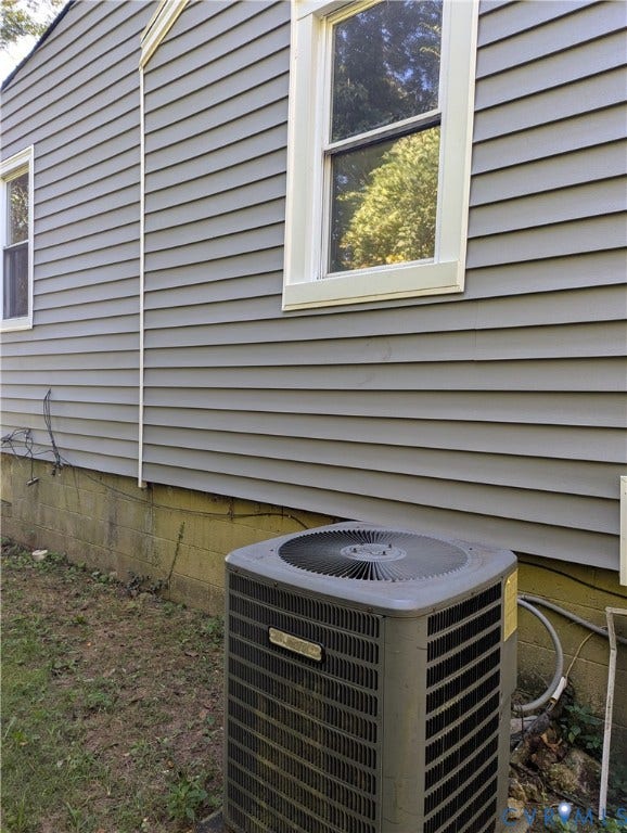 2218 Concord Avenue, Richmond, VA 23234 Gray horizontal siding with white trim windows and an outdoor HVAC unit