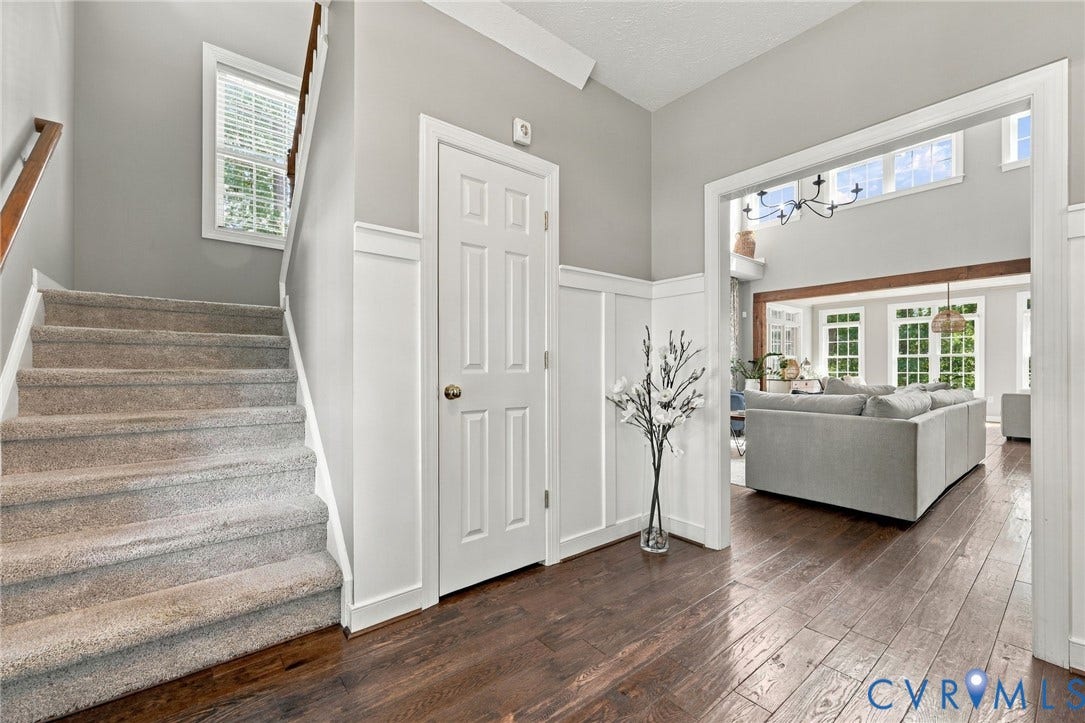 8301 Macandrew Terrace, Chesterfield, VA 23838 Hardwood flooring, wainscoting, and a carpeted staircase