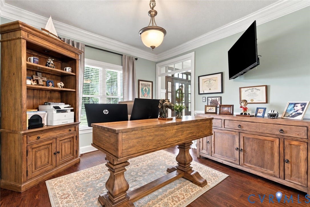 8301 Macandrew Terrace, Chesterfield, VA 23838 Wood-finish flooring, crown molding, a built-in shelving unit, and a built-in storage cabinet