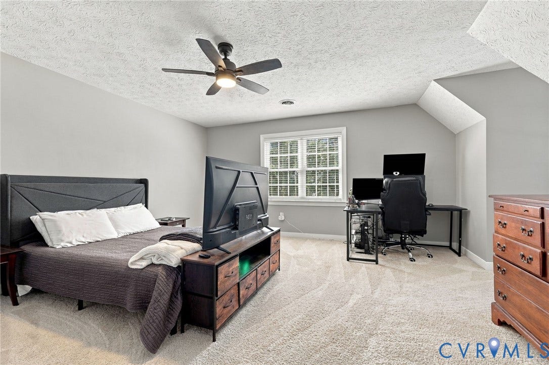 8301 Macandrew Terrace, Chesterfield, VA 23838 Carpeted room featuring a ceiling fan with light,%