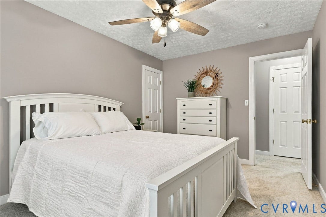 8301 Macandrew Terrace, Chesterfield, VA 23838 Neutral-toned walls complement plush carpeting
