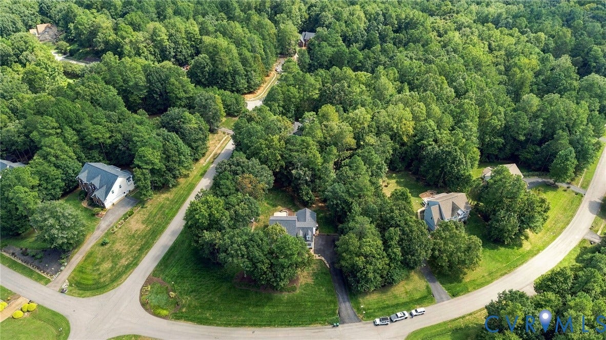 8301 Macandrew Terrace, Chesterfield, VA 23838 Wooded surroundings with established residential properties and paved roadways