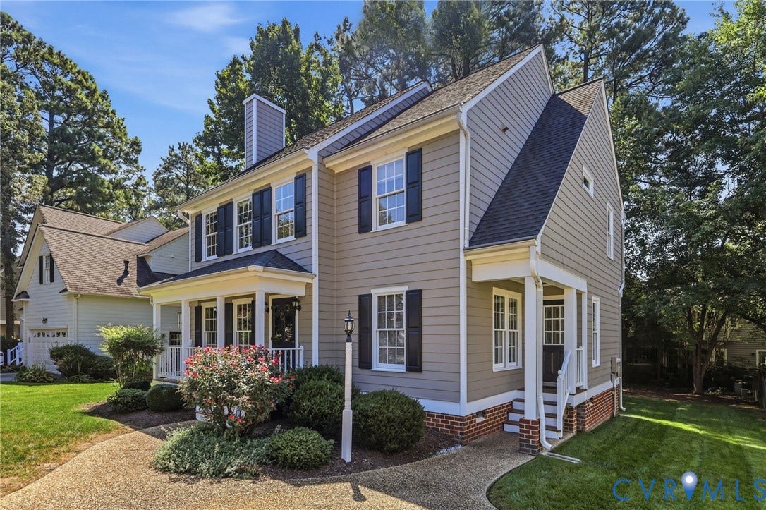 12309 Maybrook Lane, Wyndham, Glen Allen, VA 23059 Multi-level siding exterior with a covered entry, dark shutters, and a brick foundation