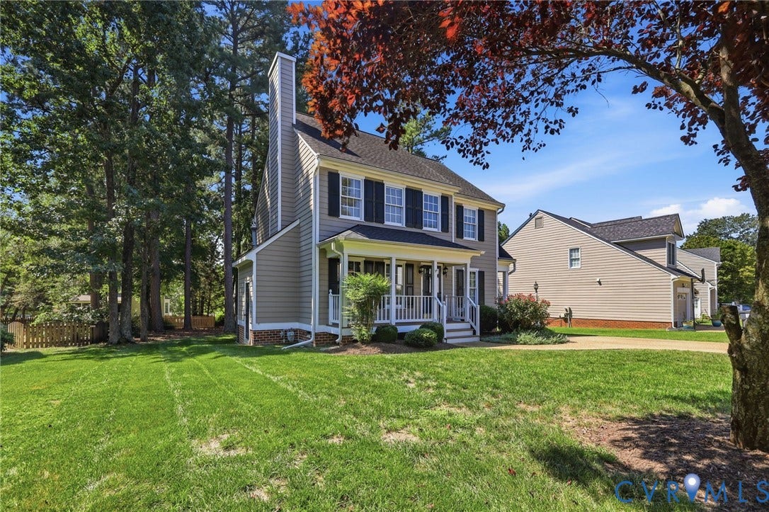 12309 Maybrook Lane, Wyndham, Glen Allen, VA 23059 Two-story residence featuring a covered front porch, exterior chimney, and dark-paneled shutters