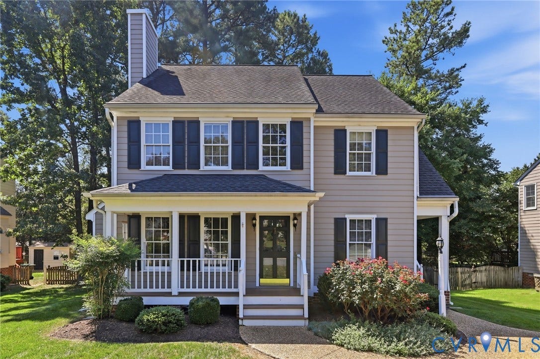 12309 Maybrook Lane, Wyndham, Glen Allen, VA 23059 Two-story residence featuring light-colored siding, dark shutters, and a covered front porch with white railings