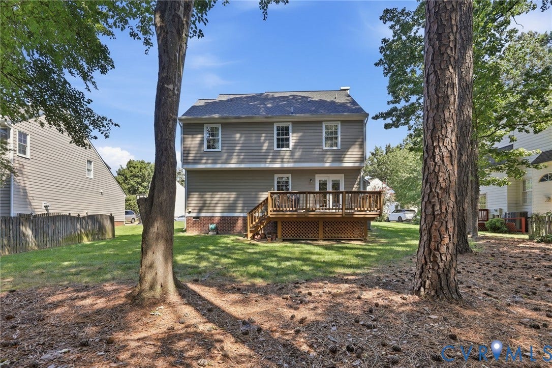 12309 Maybrook Lane, Wyndham, Glen Allen, VA 23059 Two-story exterior with siding, a gabled roof, and a wood-tone deck
