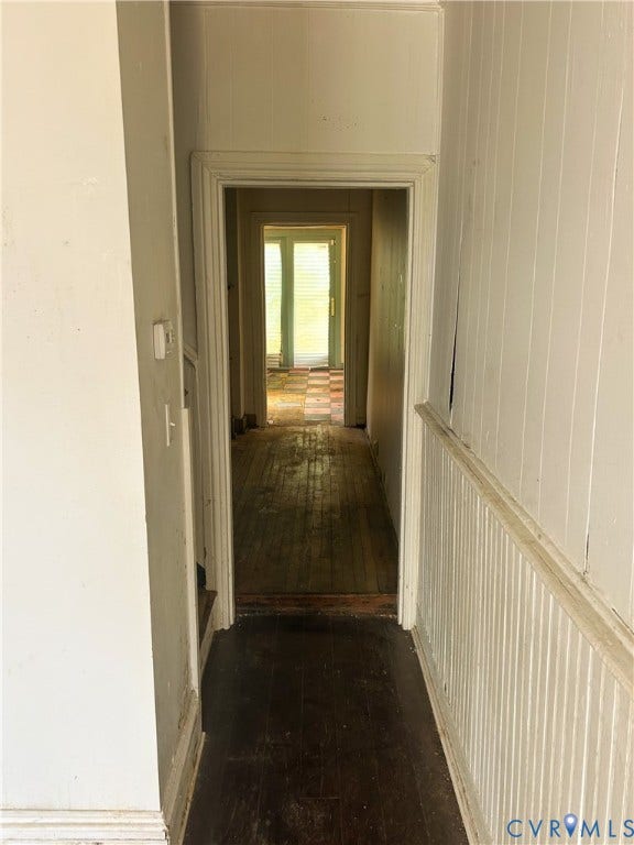 2709 E Clay Street, Church Hill, Richmond, VA 23223 Wood-finish flooring throughout, featuring a hallway with beadboard wainscoting and classic door frames