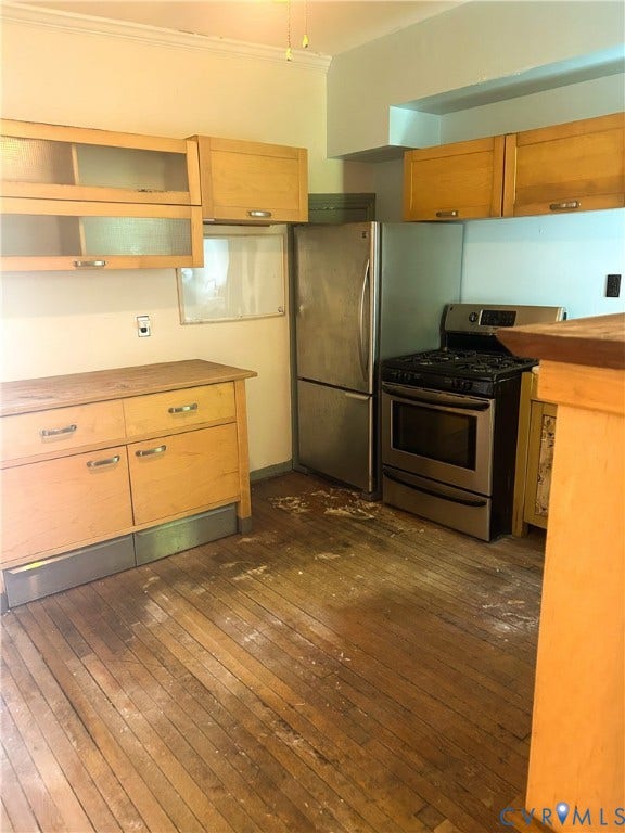 2709 E Clay Street, Church Hill, Richmond, VA 23223 Wood-finish flooring with perimeter cabinetry, stainless steel refrigerator, and stainless steel range