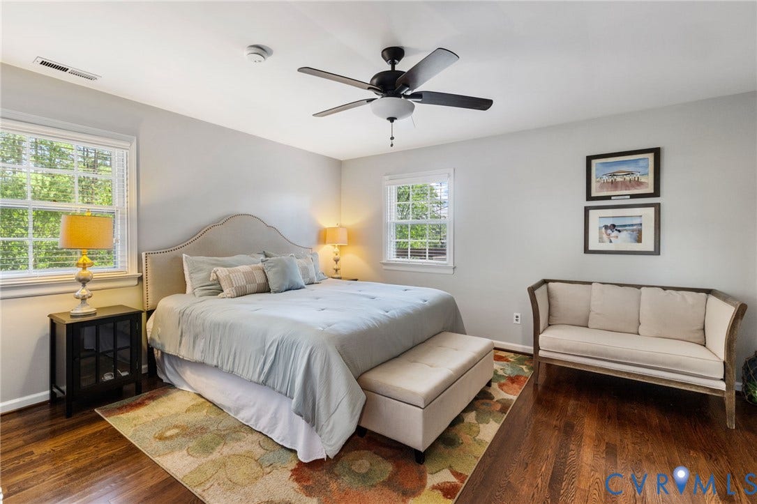 1109 Swissvale Place, Henrico, VA 23229 Hardwood flooring, multiple windows, ceiling fan, and neutral wall tones.