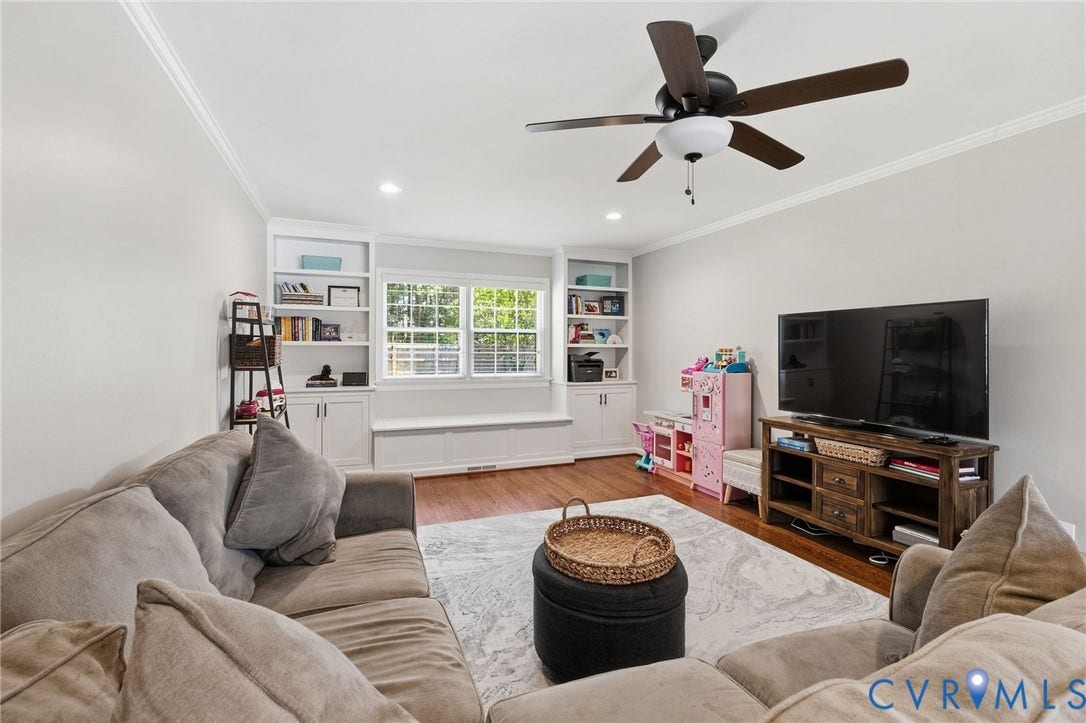 1109 Swissvale Place, Henrico, VA 23229 Recessed lighting, crown molding, and built-in shelving with lower cabinetry