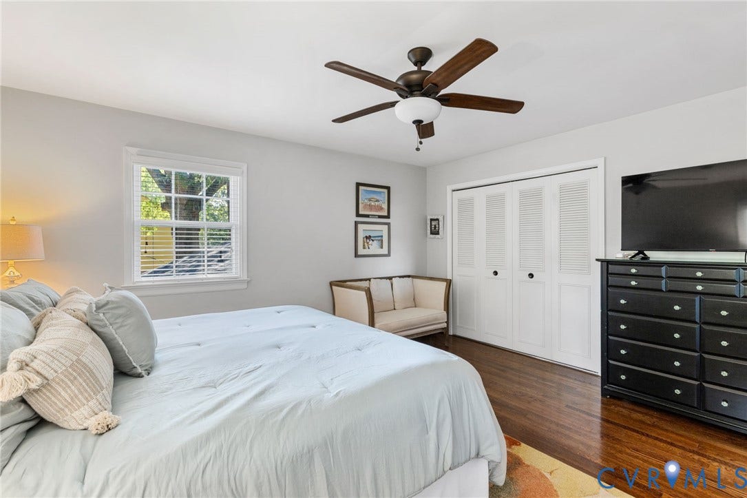 1109 Swissvale Place, Henrico, VA 23229 Hardwood flooring, white louvered closet doors, window with blinds, ceiling fan with integrated lighting