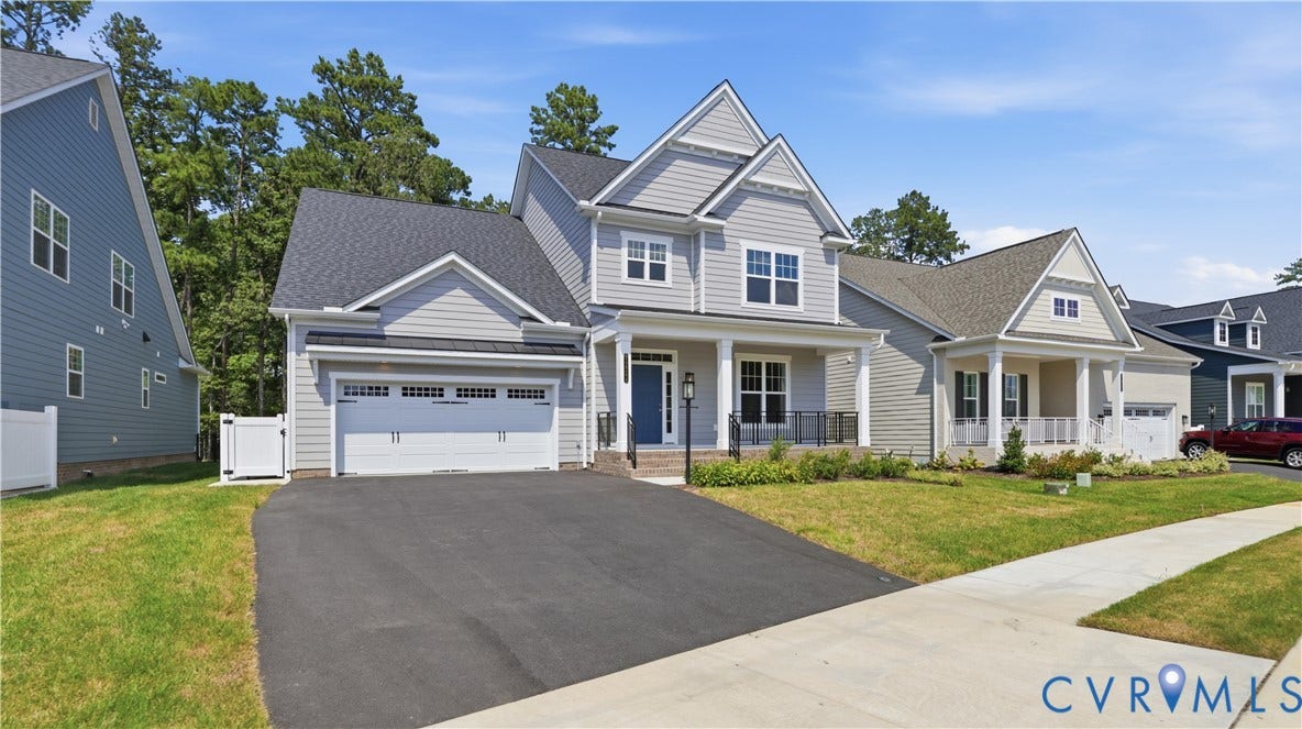 12344 Garnet Parke Circle, Short Pump Area, Glen Allen, VA 23059 Light-colored siding exterior with a dark roof and a prominent front gable