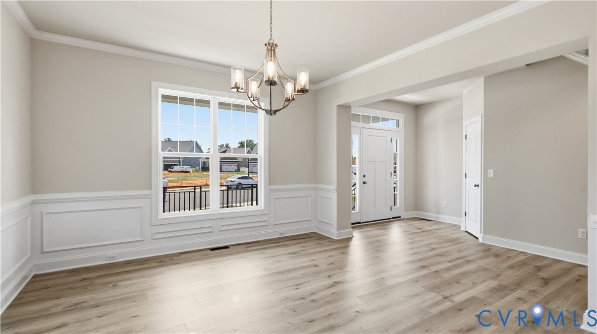12344 Garnet Parke Circle, Short Pump Area, Glen Allen, VA 23059 Luxury Vinyl Plank floors, Crown and chair railing and Picture Frame molding under chair