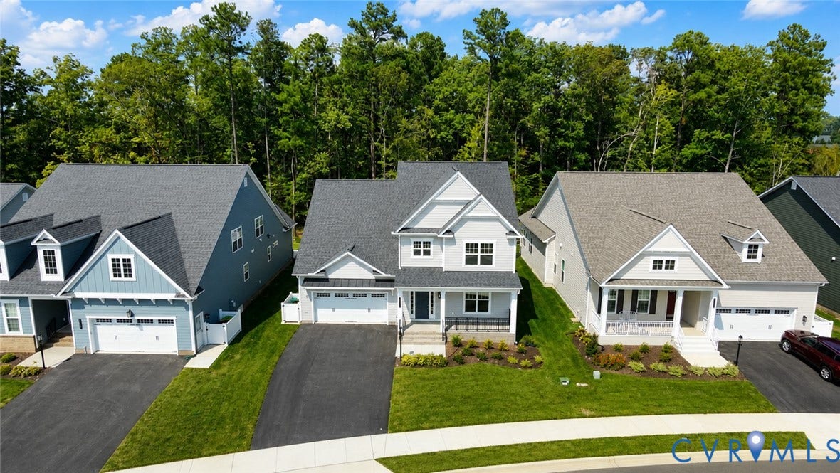 12344 Garnet Parke Circle, Short Pump Area, Glen Allen, VA 23059 Contemporary residence featuring a light-toned exterior, gabled roofline, front porch, and an attached garage